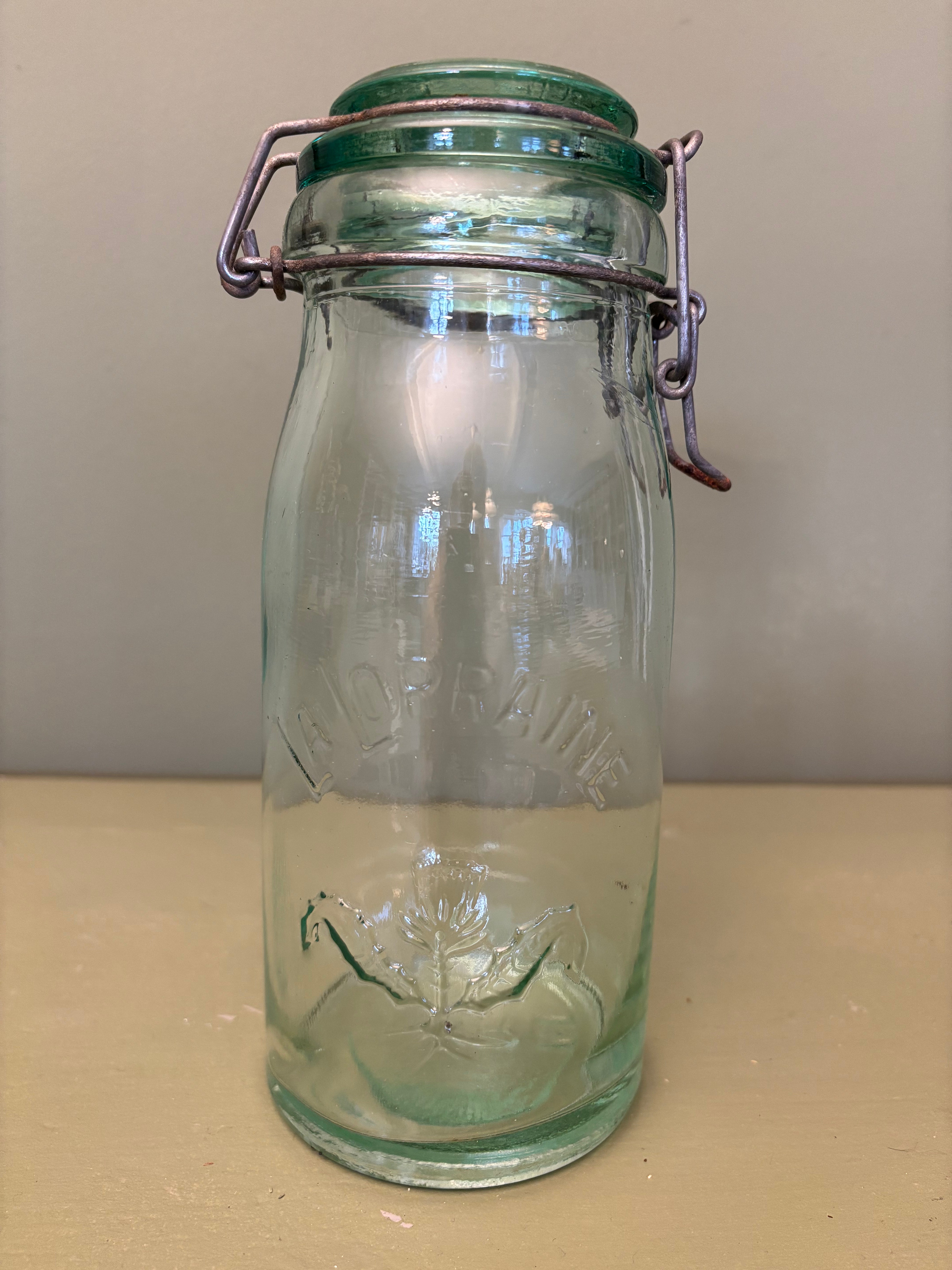 Grøn glasbeholder, h22,5 cm.