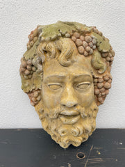 Skulptur af “vinguden” 38x28 cm